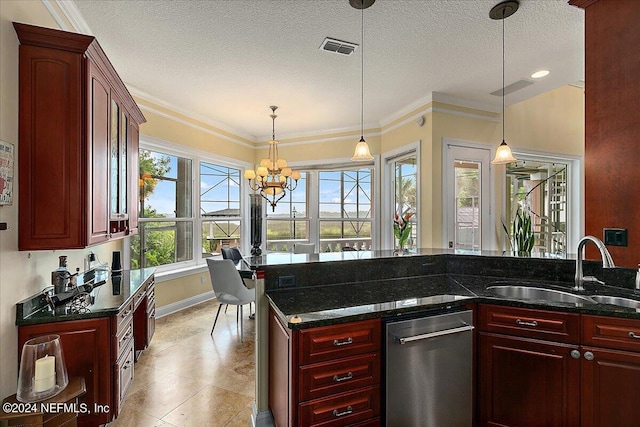 kitchen with reddish brown cabinets, a sink, and visible vents