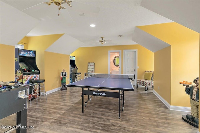 recreation room featuring ceiling fan, baseboards, and wood finished floors