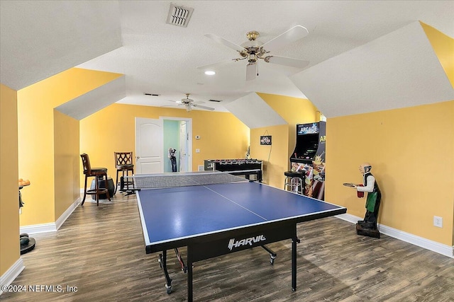 game room with lofted ceiling, visible vents, baseboards, and wood finished floors