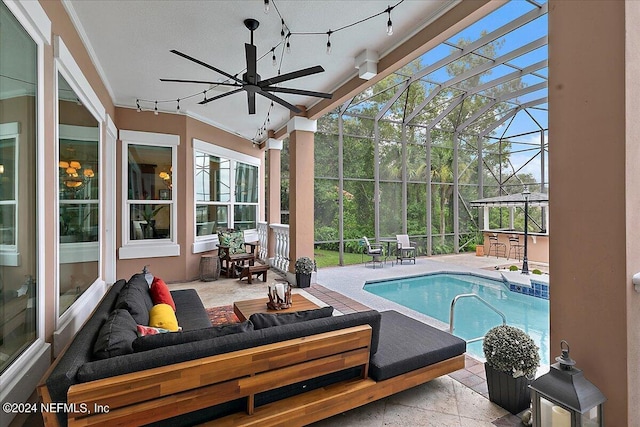 pool with a ceiling fan, a lanai, a patio area, and an outdoor living space