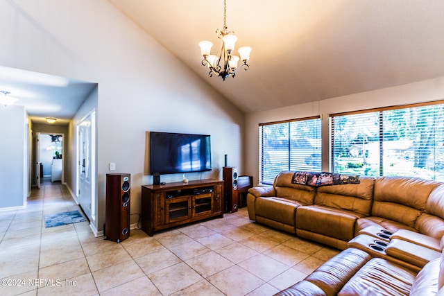 living room with high vaulted ceiling, light tile patterned flooring, and a chandelier