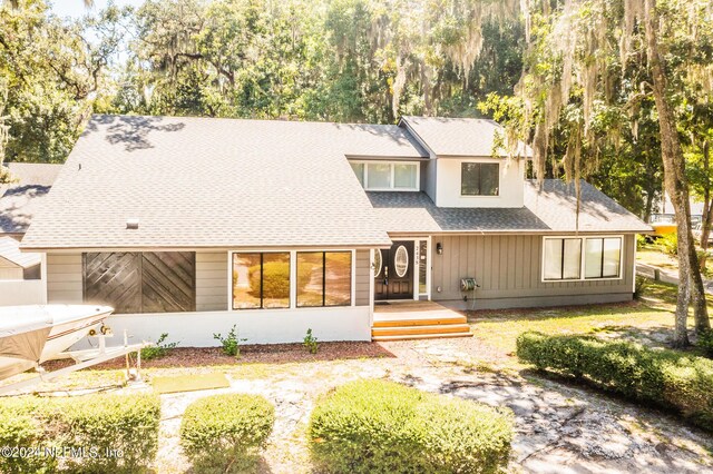 view of front of house featuring a wooden deck