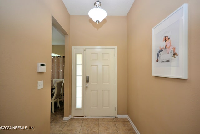 view of tiled foyer entrance