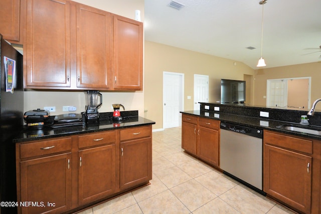 kitchen featuring light tile patterned flooring, dishwasher, sink, dark stone counters, and hanging light fixtures