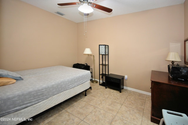 bedroom featuring ceiling fan and light tile patterned flooring