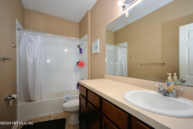 full bathroom featuring tile patterned floors, toilet, vanity, and shower / bath combo