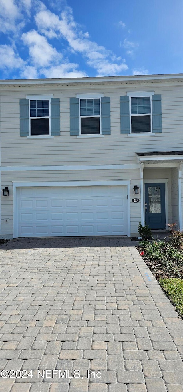 view of front property with a garage