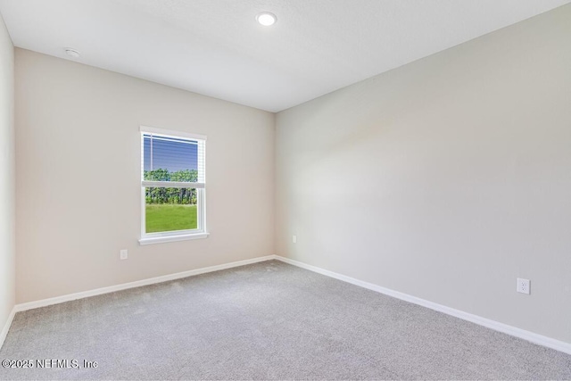 unfurnished room with carpet floors