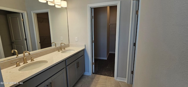 bathroom featuring vanity and tile patterned flooring