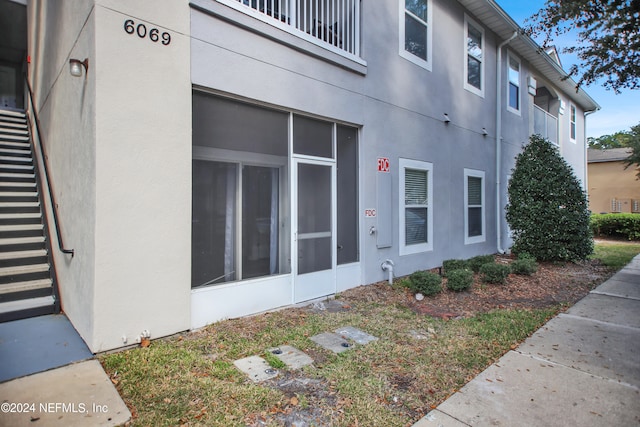 view of property exterior featuring a balcony