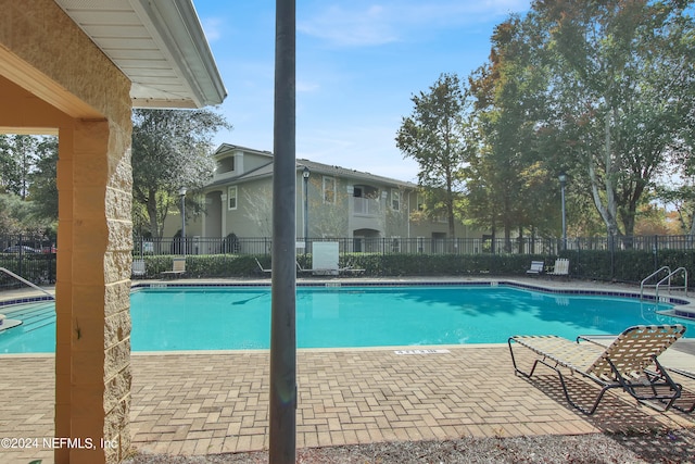 view of pool with a patio area