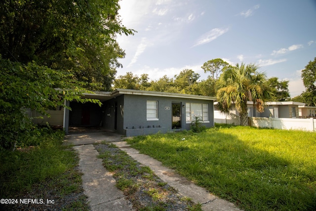 view of front of house featuring a carport