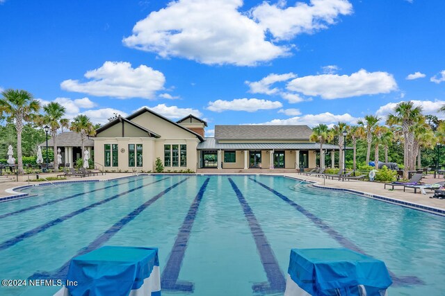 view of pool featuring a patio