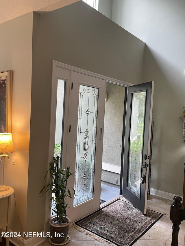 view of tiled foyer entrance