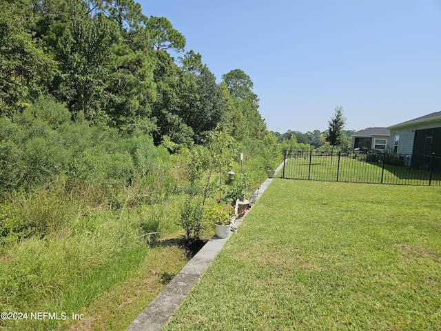 view of yard with fence