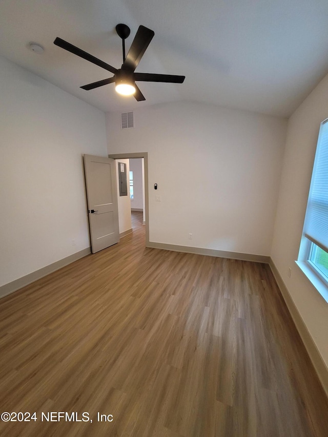 spare room with light hardwood / wood-style flooring and ceiling fan