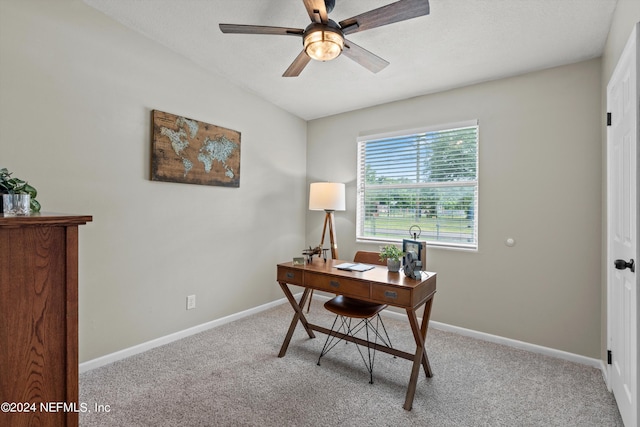 office area with light carpet, baseboards, and a ceiling fan