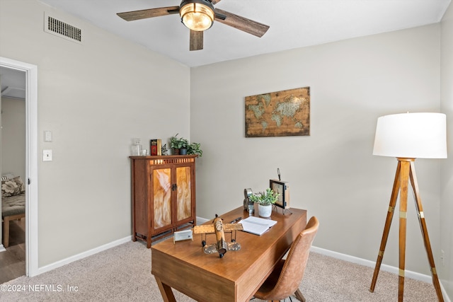 dining room featuring light carpet, visible vents, and baseboards