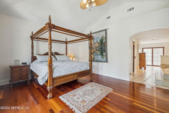 bedroom featuring lofted ceiling, hardwood / wood-style floors, and ceiling fan