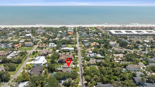 bird's eye view featuring a beach view and a water view