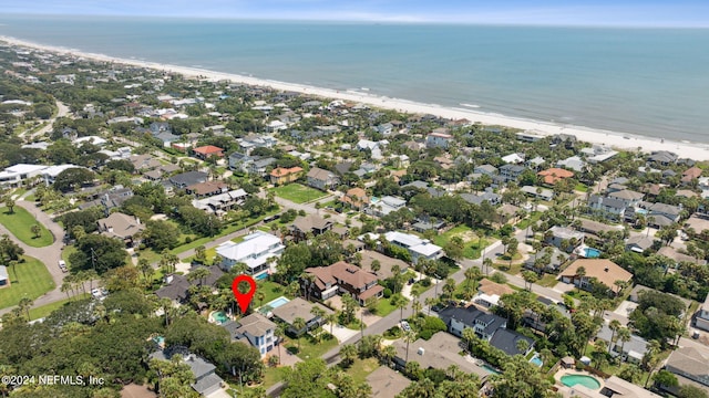 bird's eye view with a view of the beach and a water view