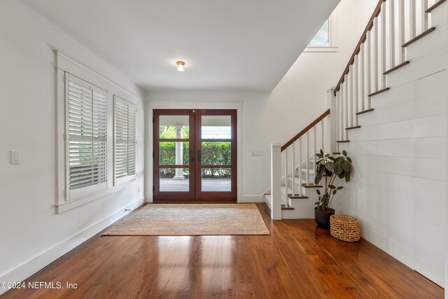 foyer featuring french doors and hardwood / wood-style flooring