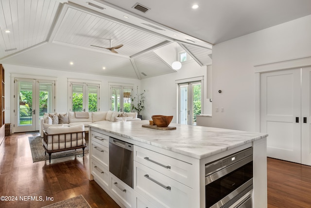 kitchen with white cabinets, ceiling fan, stainless steel appliances, and french doors