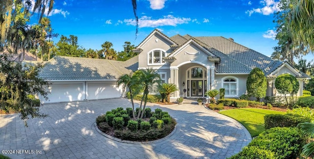 view of front of house with a garage