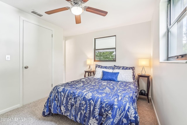 bedroom with carpet floors and ceiling fan