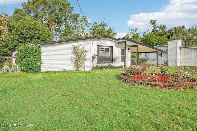 exterior space featuring a front yard