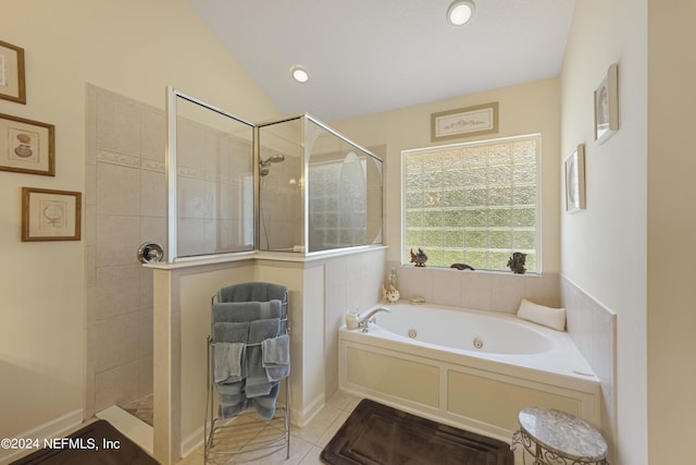 full bathroom with lofted ceiling, tile patterned floors, a jetted tub, a walk in shower, and recessed lighting