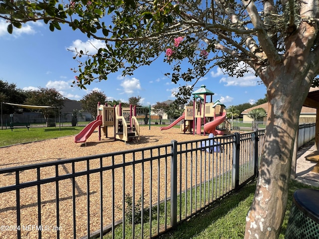 community play area featuring fence