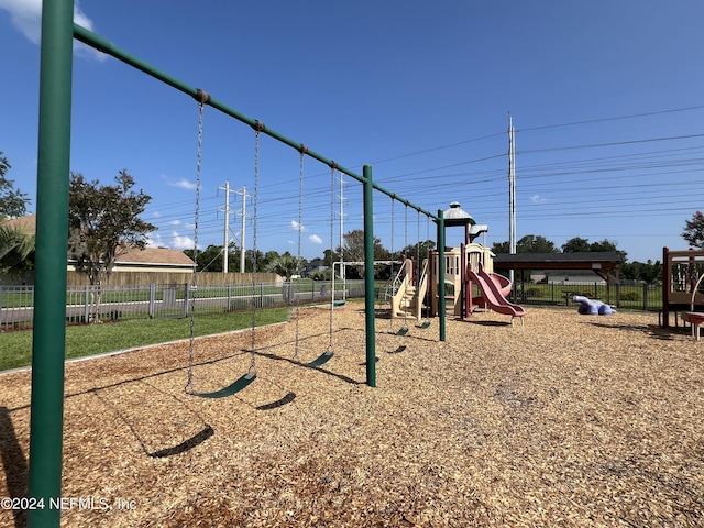 community play area featuring fence