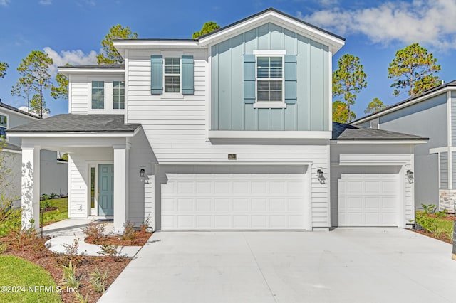 view of front of property featuring a garage