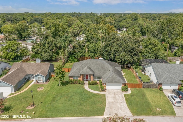 aerial view featuring a view of trees