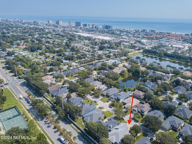 drone / aerial view with a water view