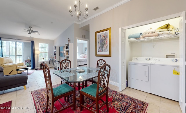 tiled dining space featuring washer and clothes dryer, ceiling fan with notable chandelier, and crown molding