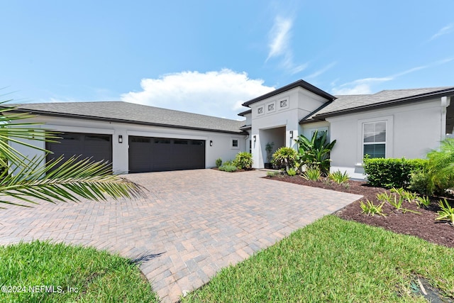 view of front of house with a garage