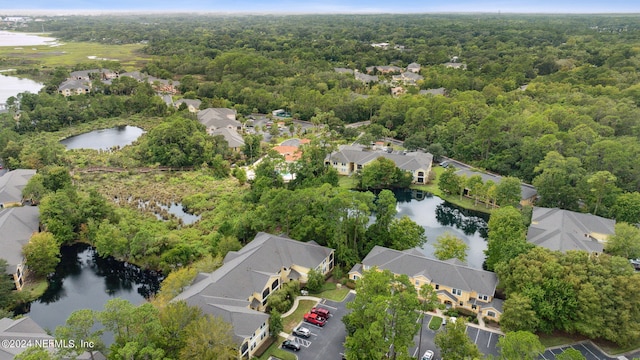 bird's eye view with a residential view and a water view