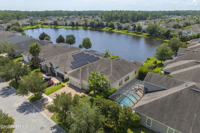 bird's eye view with a water view and a residential view