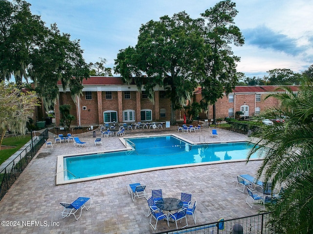 view of pool with a patio area