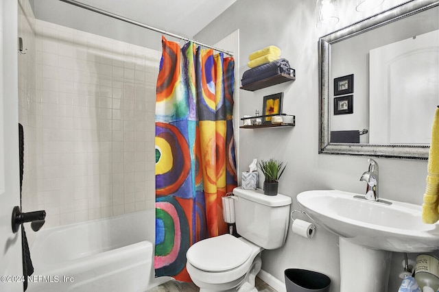 bathroom featuring toilet and shower / bath combo