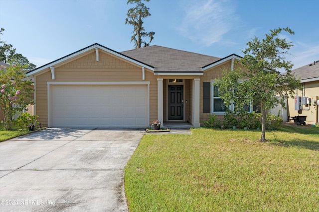 ranch-style house with a front yard and a garage