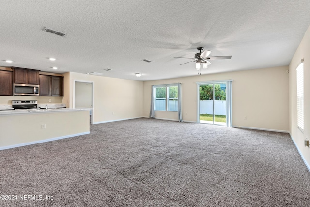 unfurnished living room with light carpet, baseboards, visible vents, and a ceiling fan