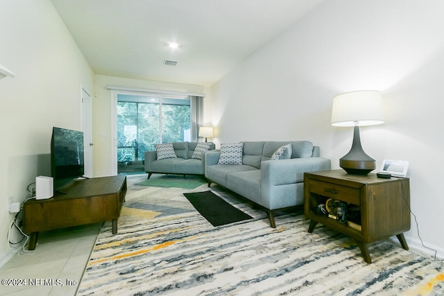 living room featuring light tile patterned floors