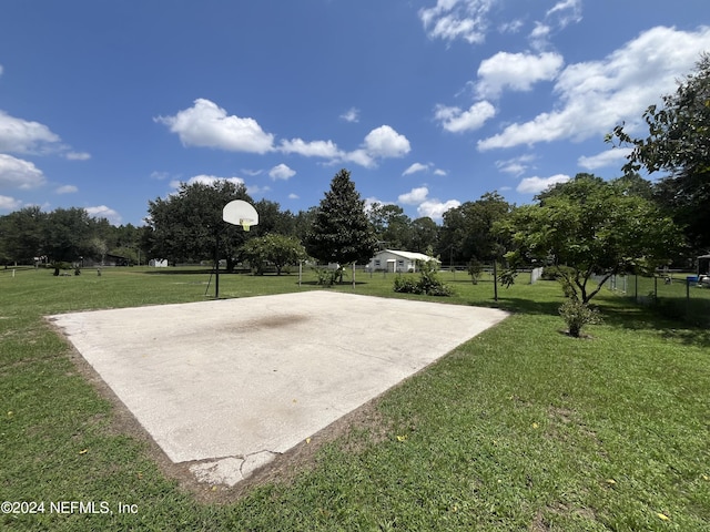 35095 Brandy Ln, Callahan, FL 32011 - view of sport court featuring community basketball court, a yard, and fence