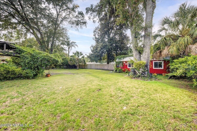 view of yard with fence