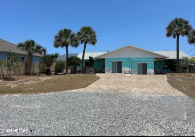 view of front of home with concrete driveway