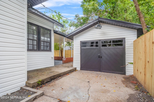 view of outbuilding featuring a garage