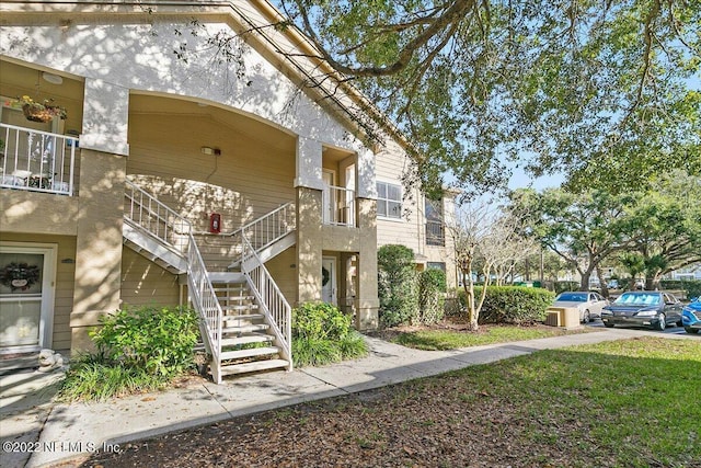 view of property with stairs